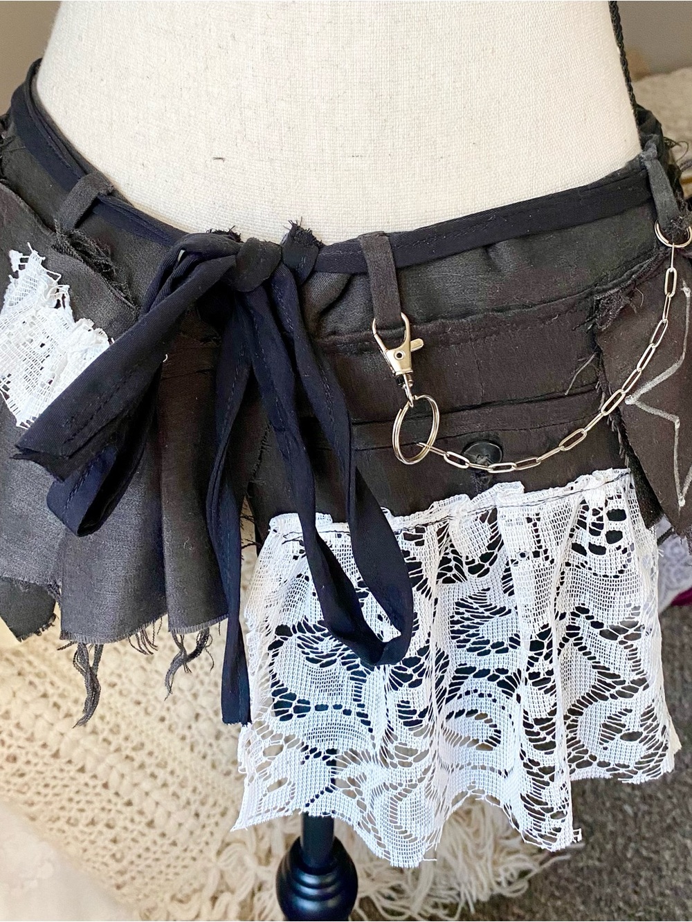 Black Lace-Trim Mini Skirt with Chain Accent